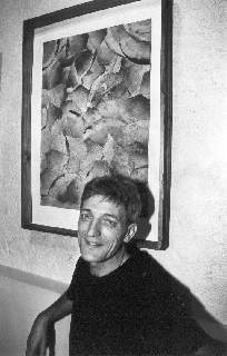 Ren Vidal devant un collage de la srie "Filtres  Caf"